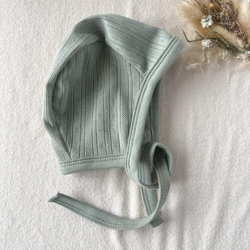 Détail pointelle 100% coton vert sauge béguin bébé – texture ajourée certifiée Oeko-Tex Maison Piou Piou