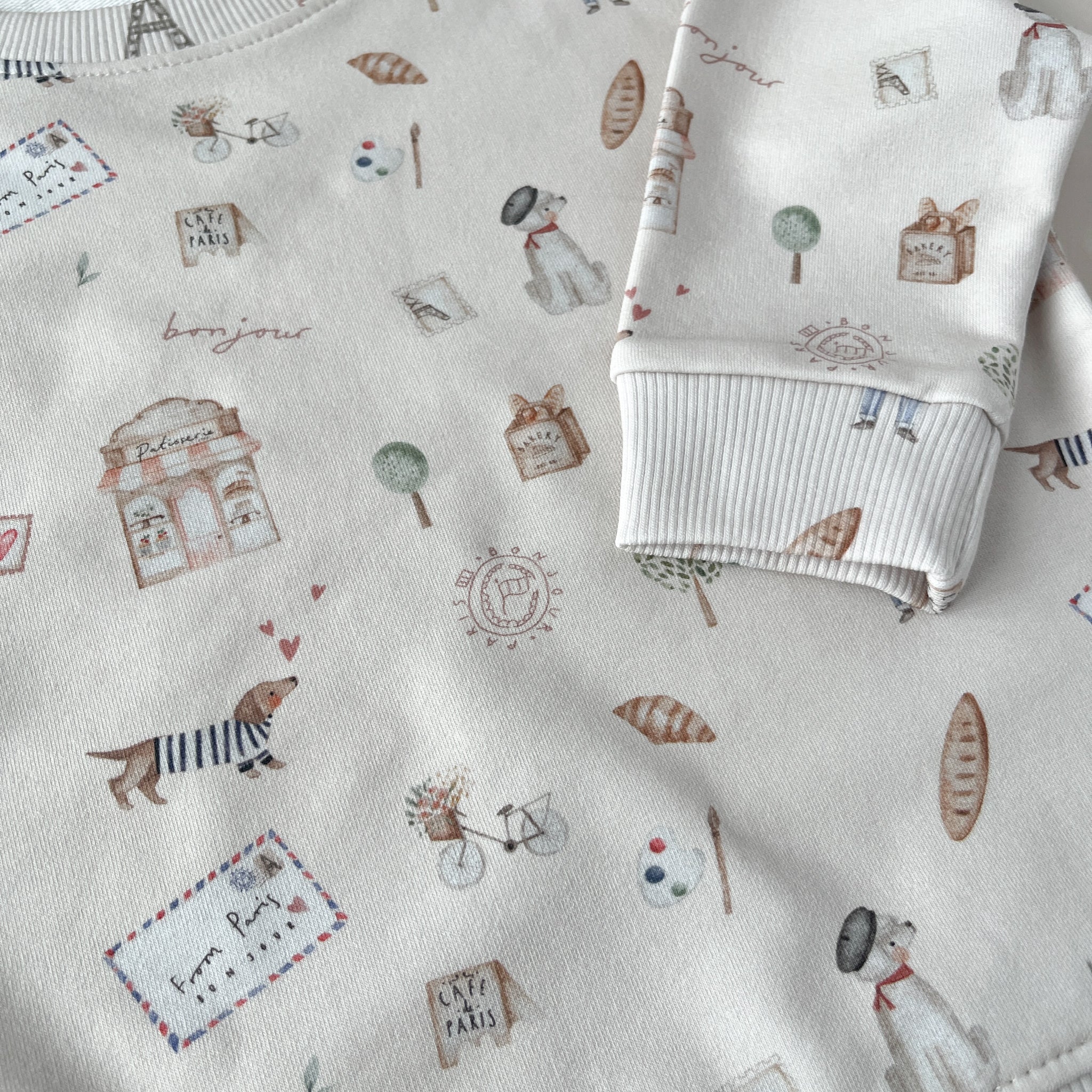 sweat bebe et enfant motif paris avec un teckel croissant tour eiffel